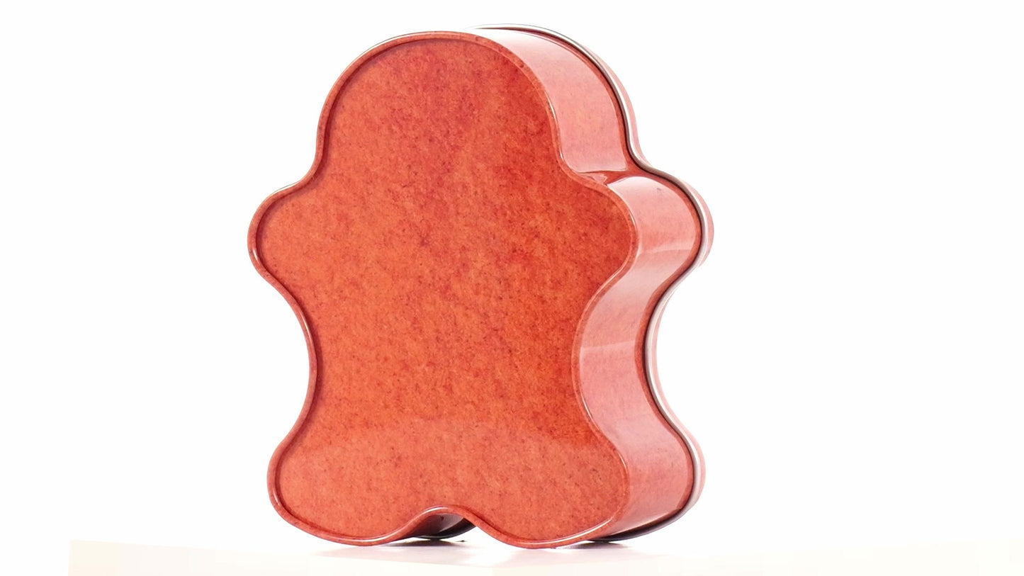 Metal box in the shape of a gingerbread man