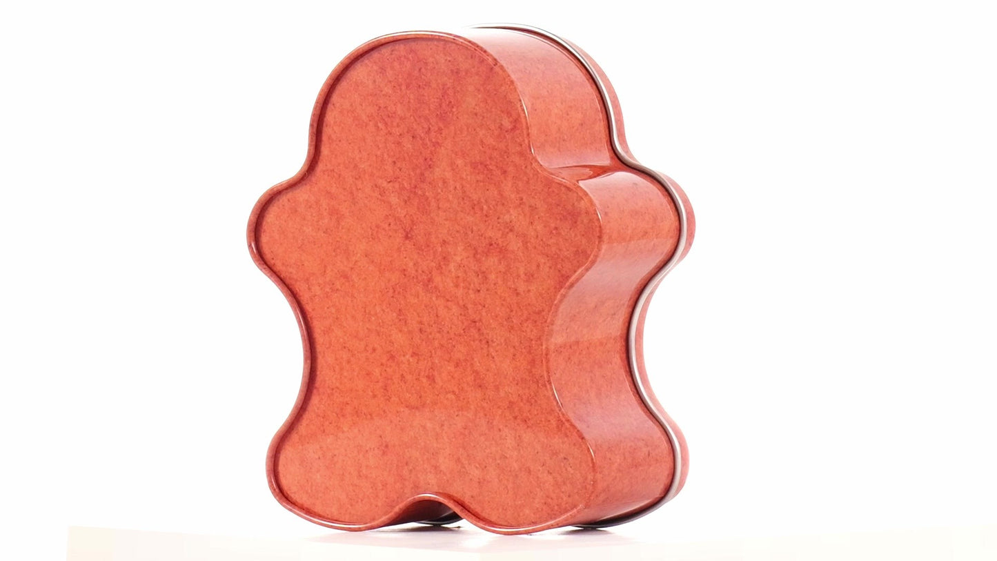 Metal box in the shape of a gingerbread man