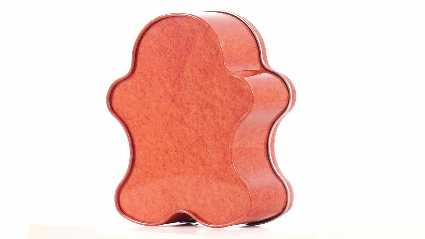 Metal box in the shape of a gingerbread man